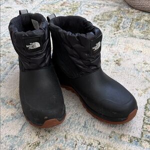 The North Face womens Black and Brown Boots